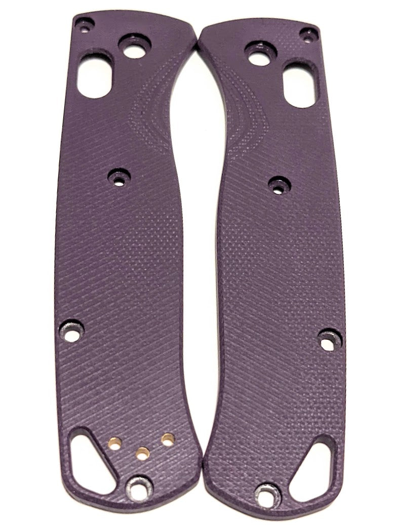 Purple G-10 aftermarket scales for the Benchmade Bugout with a angle parallel milling pattern